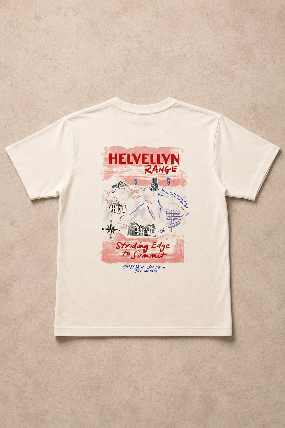 An off-white short-sleeve t-shirt laid flat on a textured beige background, featuring a red and blue graphic print on the back with the text 'HELVELYNN RANGE' and 'Standing Edge to Summit'.