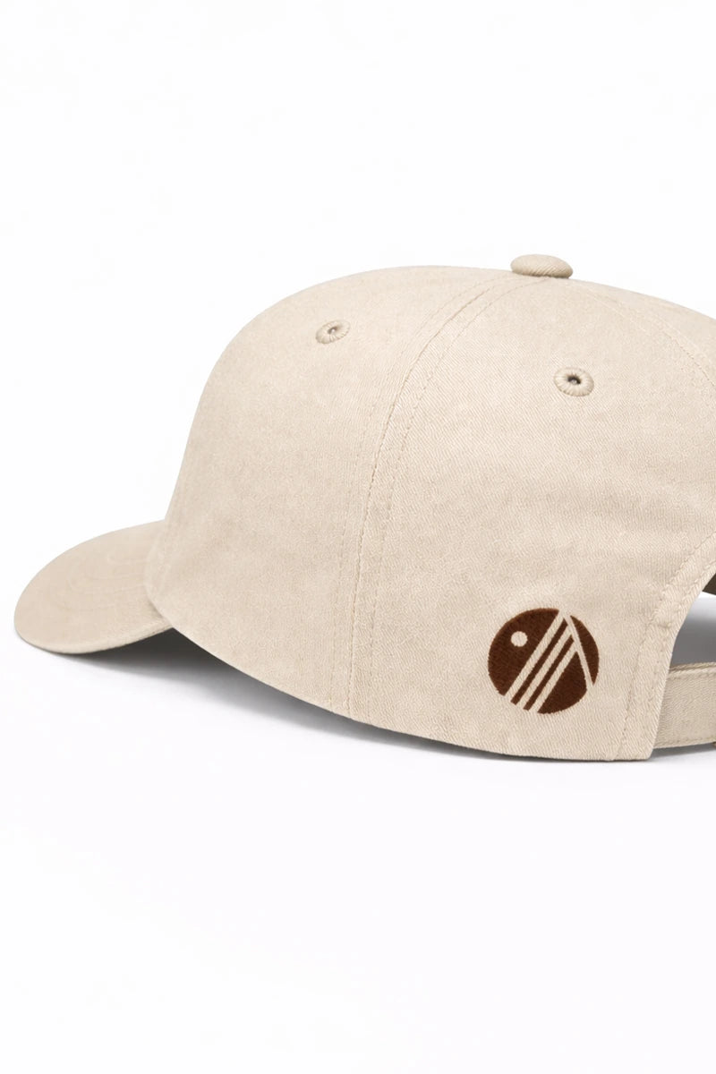 Beige cap with a logo on a white background